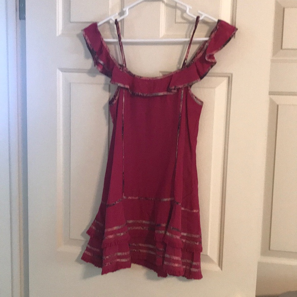 Silk top off the shoulder.